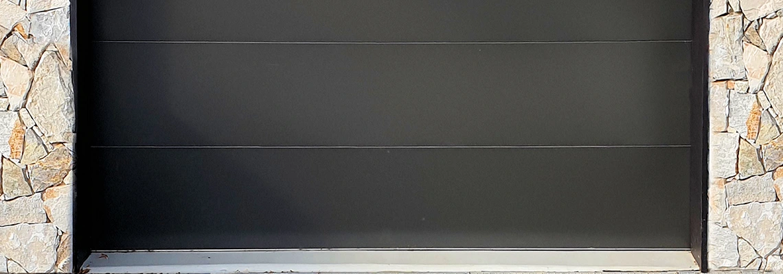 Overhead Black Garage Door Installation in Addison, Illinois